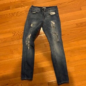 Ripped washed skinny jeans